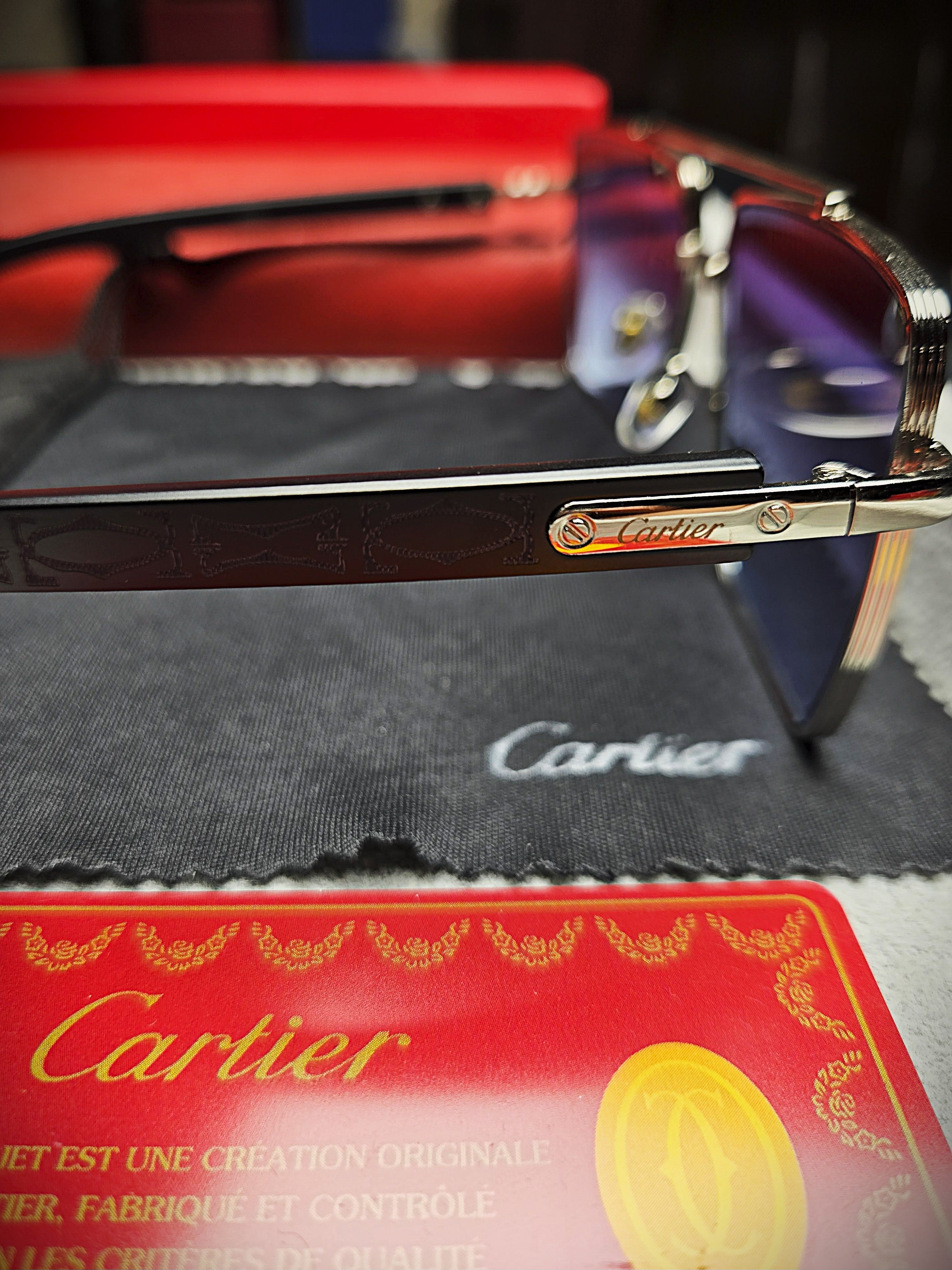 Cartier Black Frame Eyeglasses with Blue-Tinted Lenses