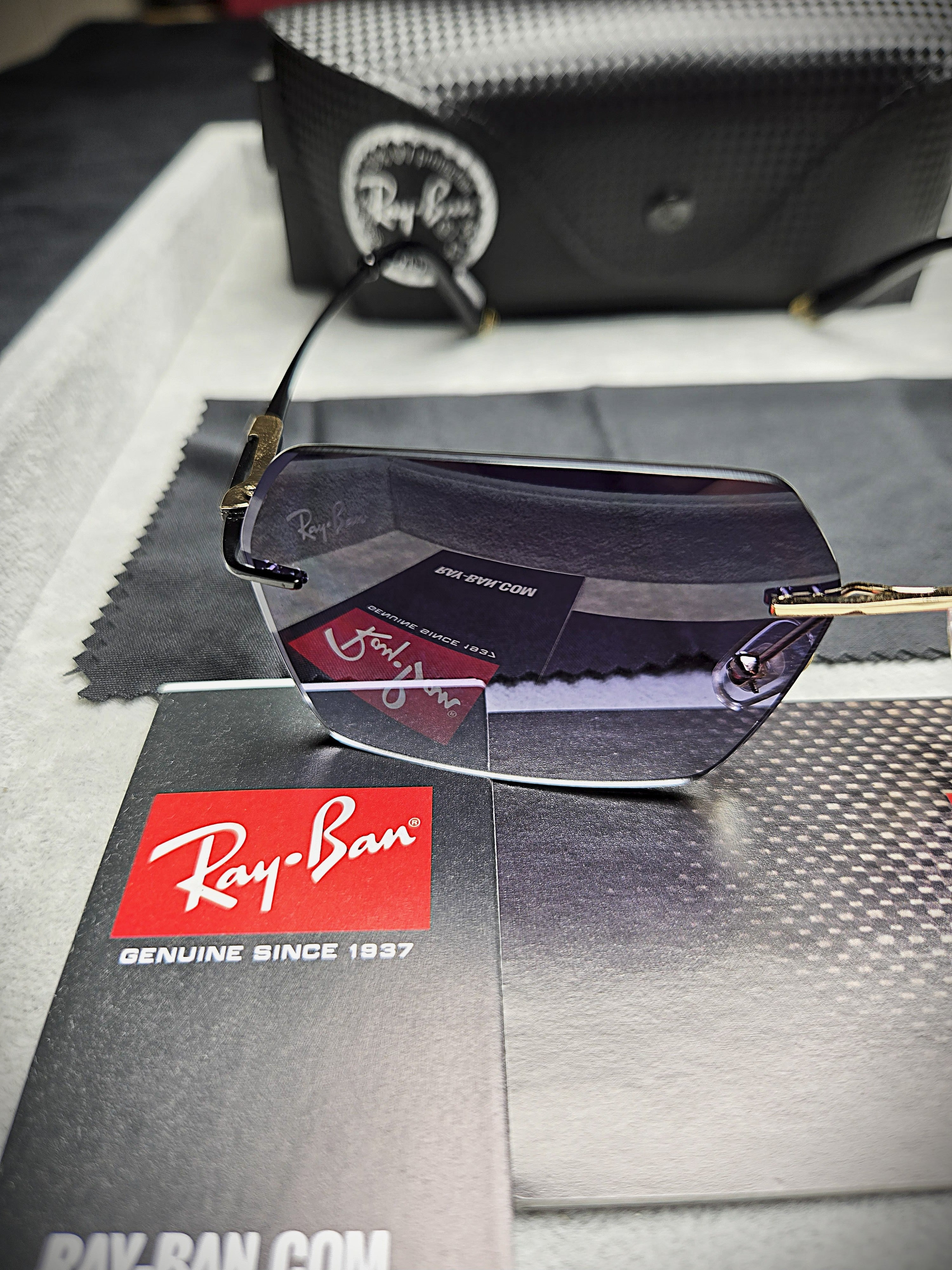 Ray-Ban Black Frame Glasses with Purple-Tinted Lenses
