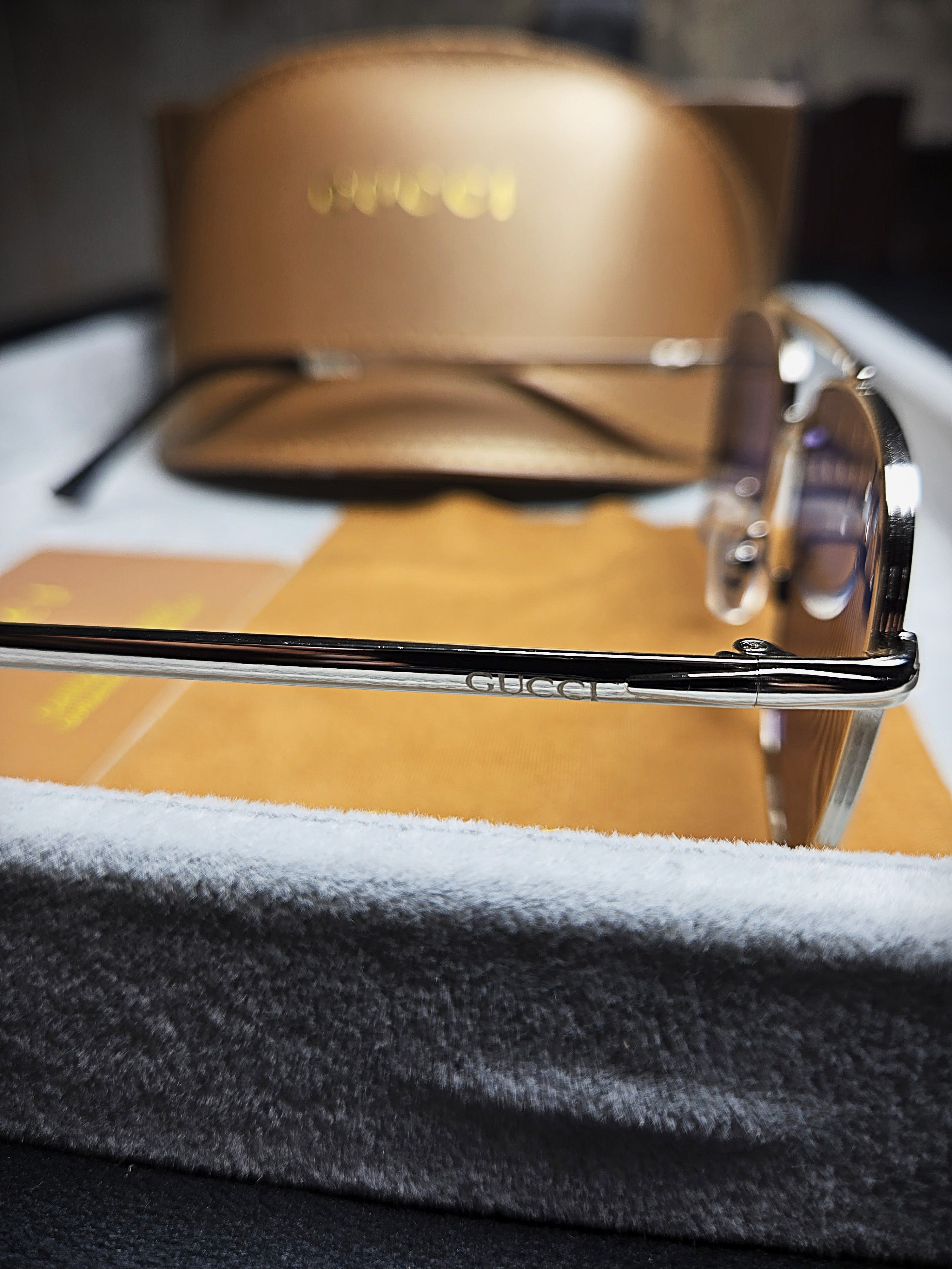 Gucci Black Oval Sunglasses