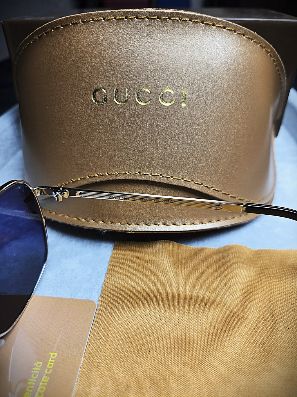 Gucci Black Oval Sunglasses
